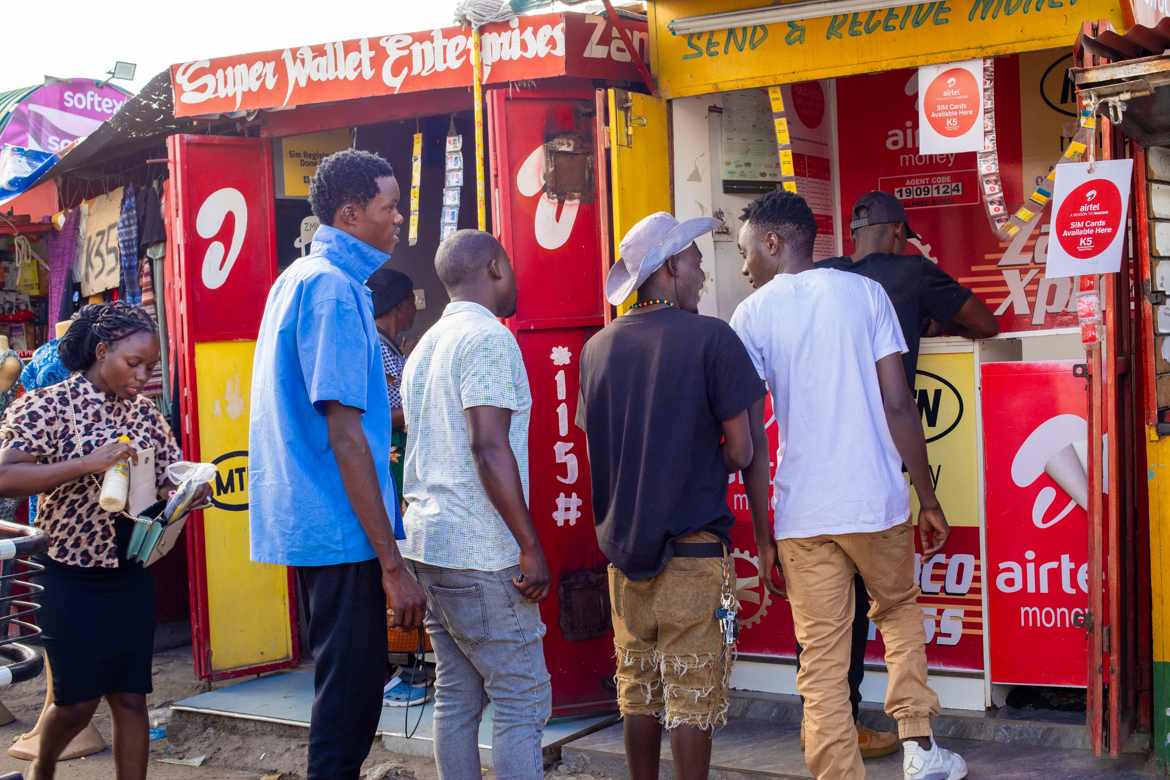 People queuing at a Mobile Money agent