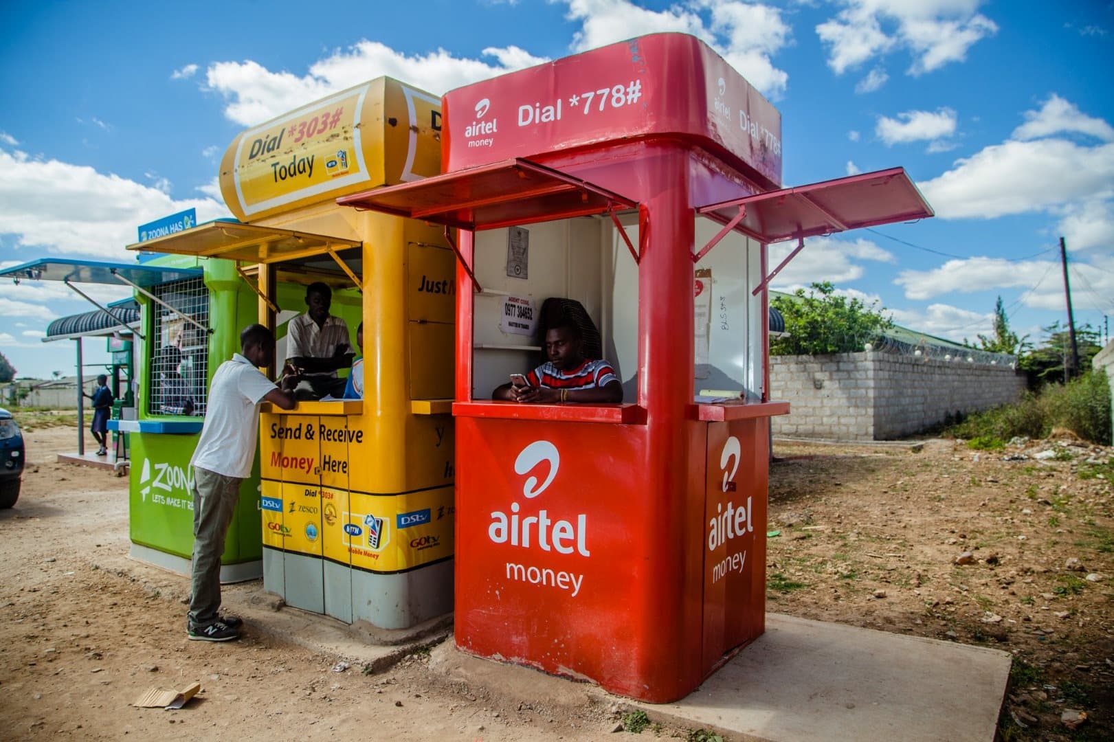 People queuing at a Mobile Money agent